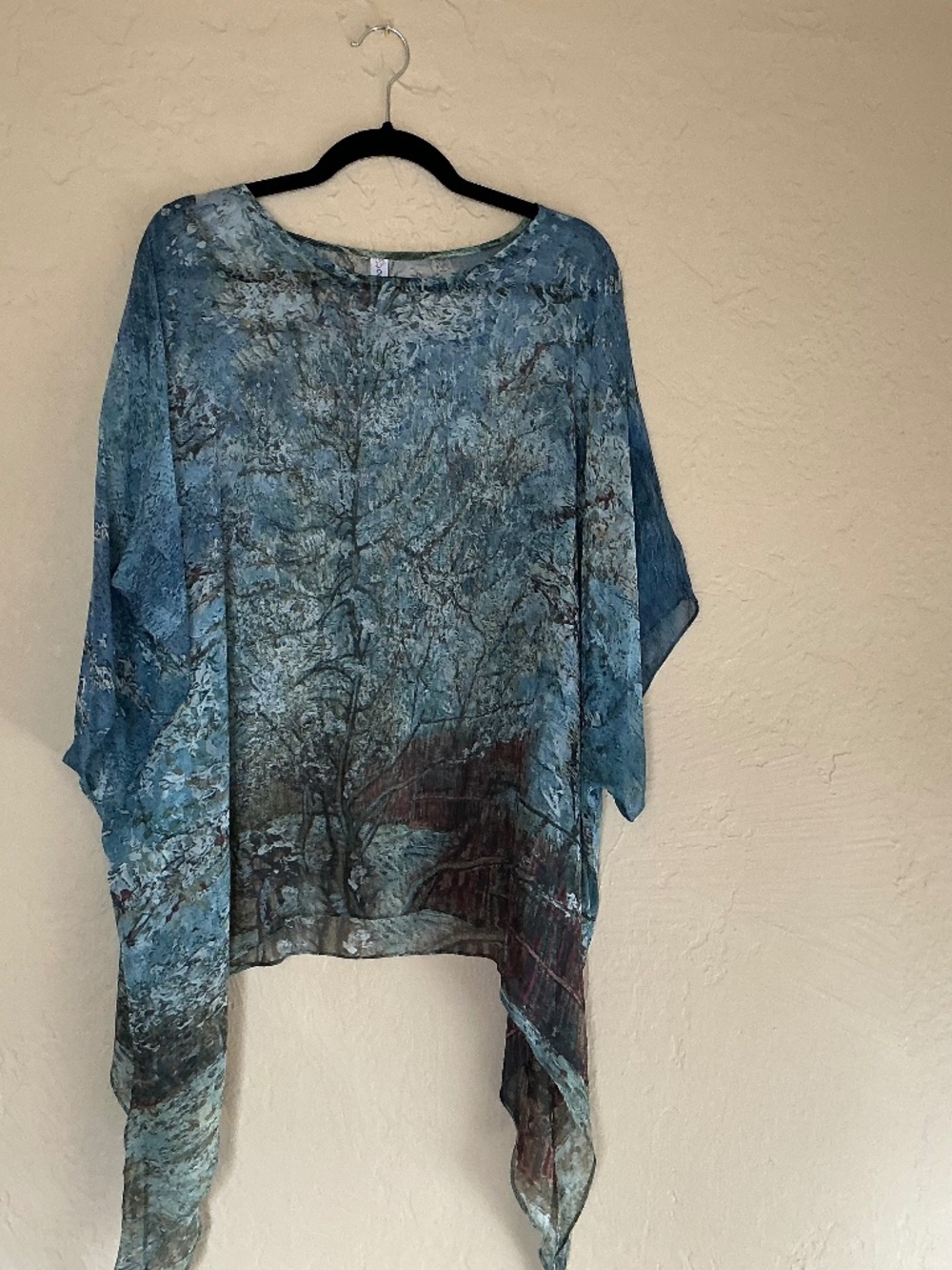 Women's flowy blue artistic silk poncho top